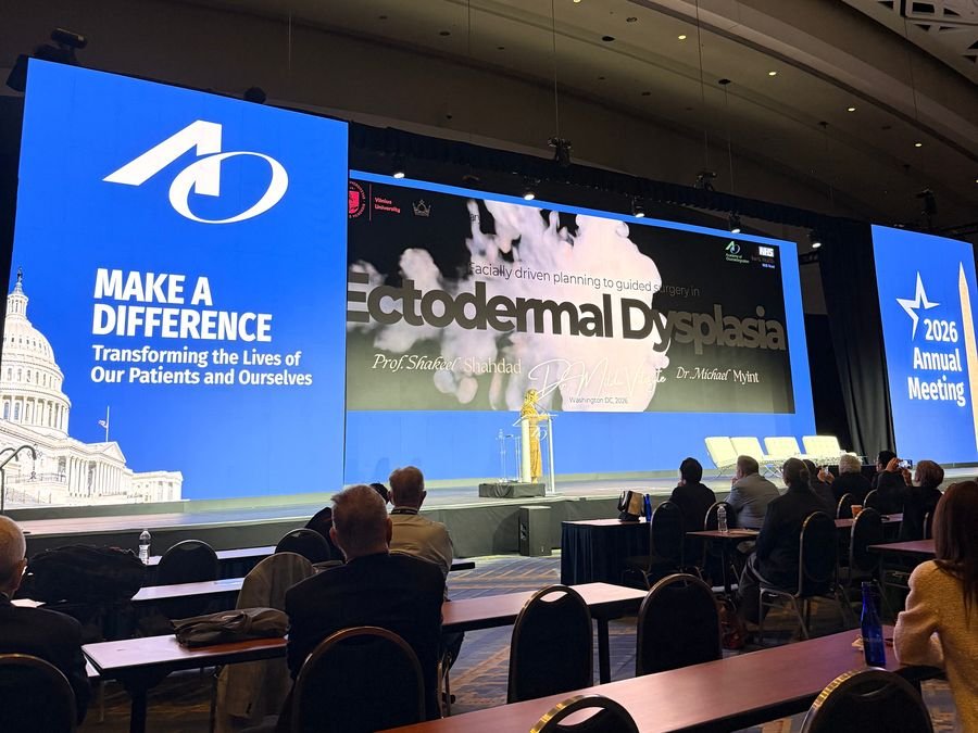 Milda Vitosytė speaking on the main stage of the Academy of Osseointegration congress in Washington, DC