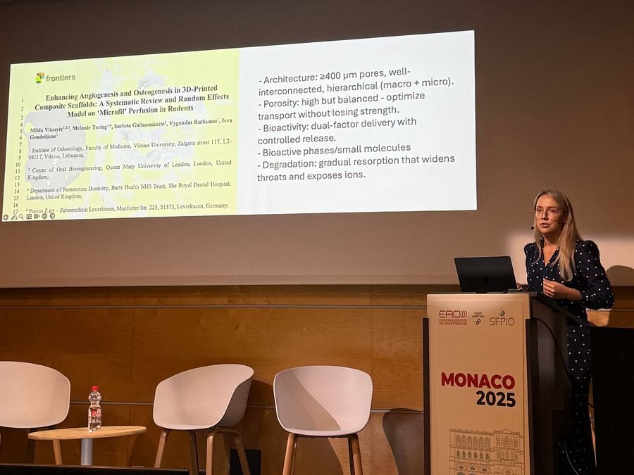 Milda Vitosytė presenting at the lectern at the EAO Congress in Monaco, 2025